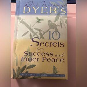 Source Unknown Yellow and Purple Book